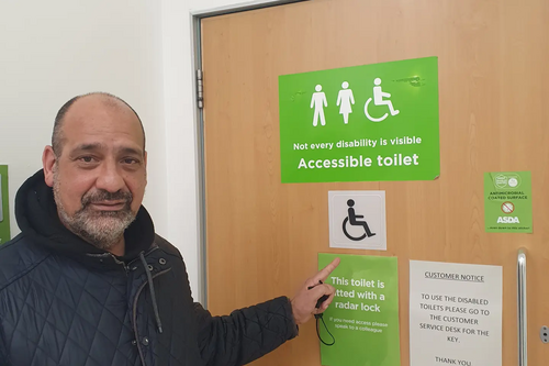 Cllr Joe Naitta With A New Disabled Toilet Sign