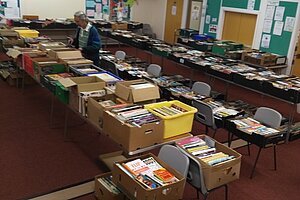 Room full of books waiting to be sold